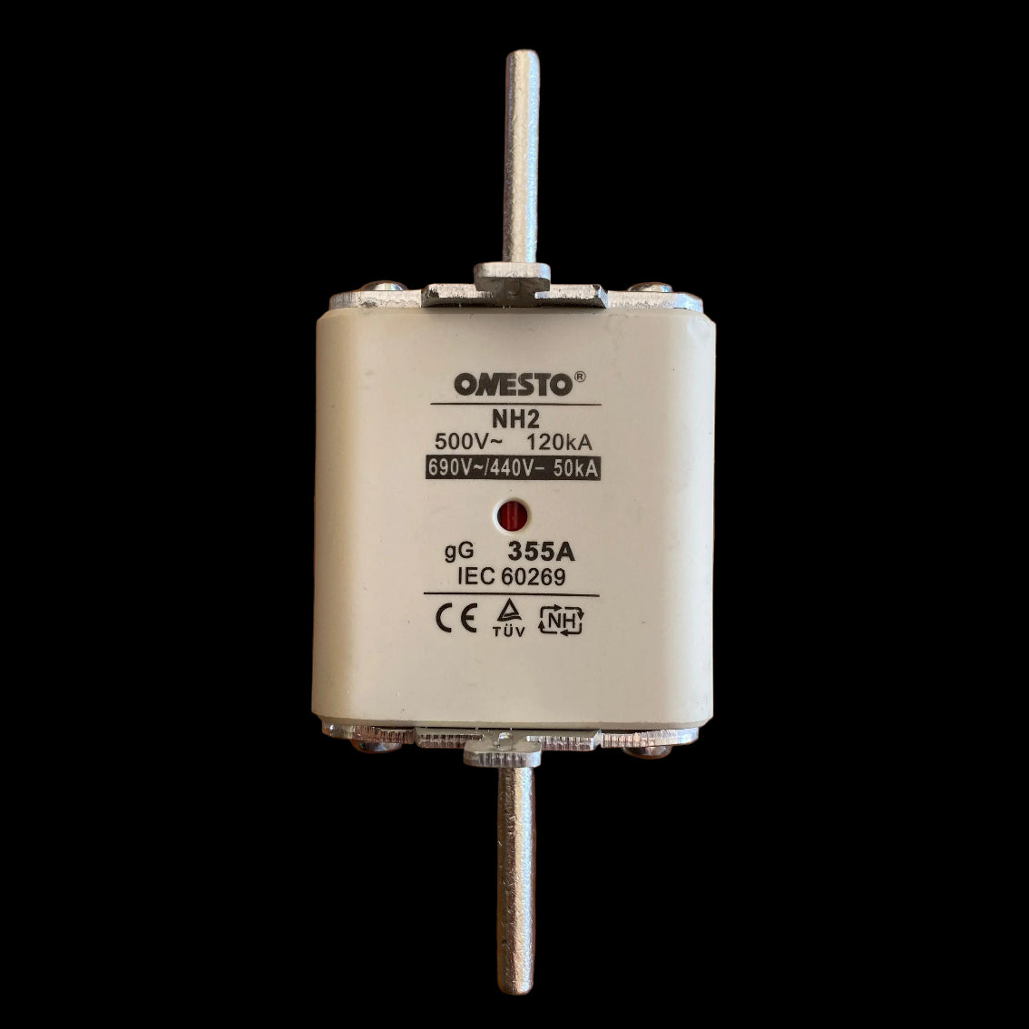 An Omesto NH2 electrical fuse, model 355A, 350V~ 120kA, 650VDC 250VAC, lying on a wooden surface. The fuse has a white ceramic body with silver metal terminal posts extending from the top and bottom, and black printed specifications on the front face.
